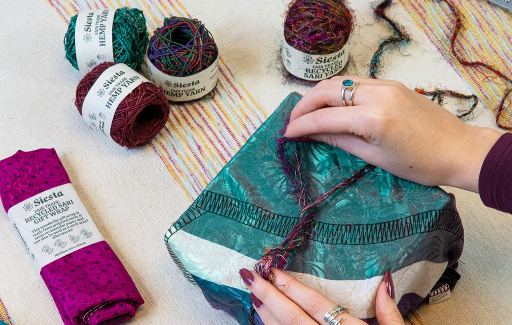 A gift wrapped up using Siesta recycled sari gift wrap.