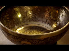 a metal singing bowl being played Siesta Crafts
